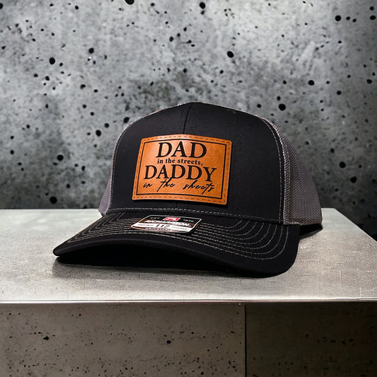 dad in the streets daddy in the sheets leather patch hats, adult humor gifts for dad or boyfriend, naught daddy hats, kinky daddy gift hats, adult humor kinky gifts for dad or husband, daddy in the streets, fathers day kinky gifts, fathers day gift hats, fathers day gifts, leather patch hats, custom leather patch hats, custom hats in texas, custom hats, personalized leather patch hats